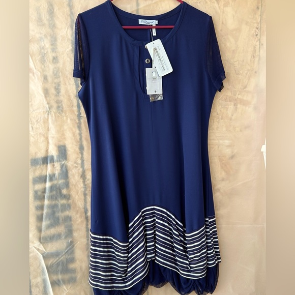 This all the tag the dress comes with the pictures I'm sending - Picture 1 of 6